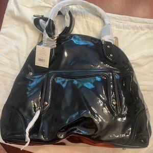NWT Cole Hann black Patent Doctor Bag

Aerin Patent